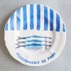 Assiette plate en faïence Poissonnerie