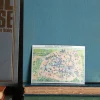 Carte postale animée - Plan de Paris