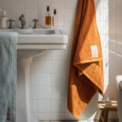 Serviette de bain en éponge - Brique de Sienne